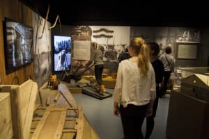 Group of people and artefacts related to ploughing.