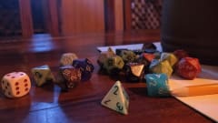 A close-up of polyhedral dice on a table