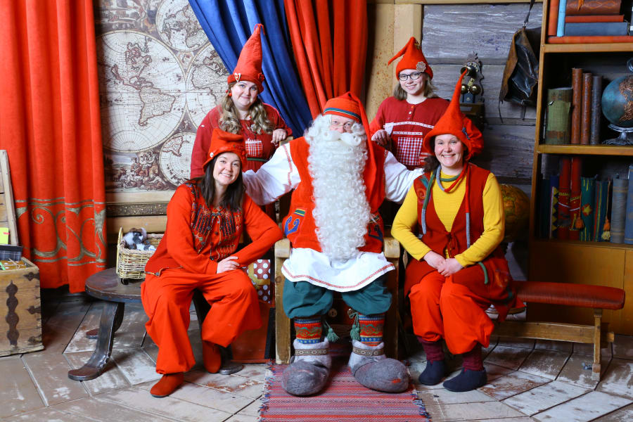 Santa Claus and the elves in Santa Claus Office.