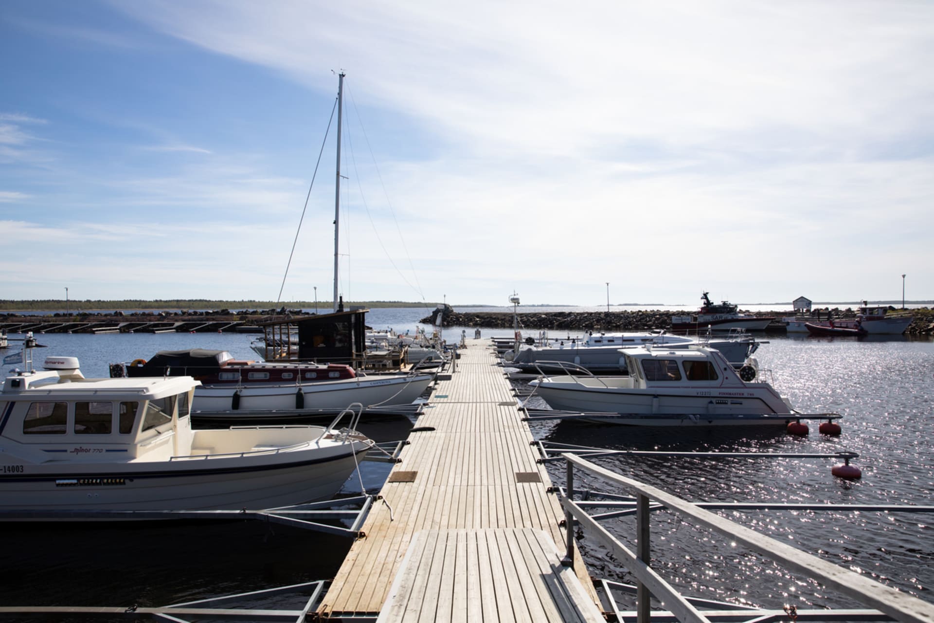 A dock and boats at Kiviniemi port.