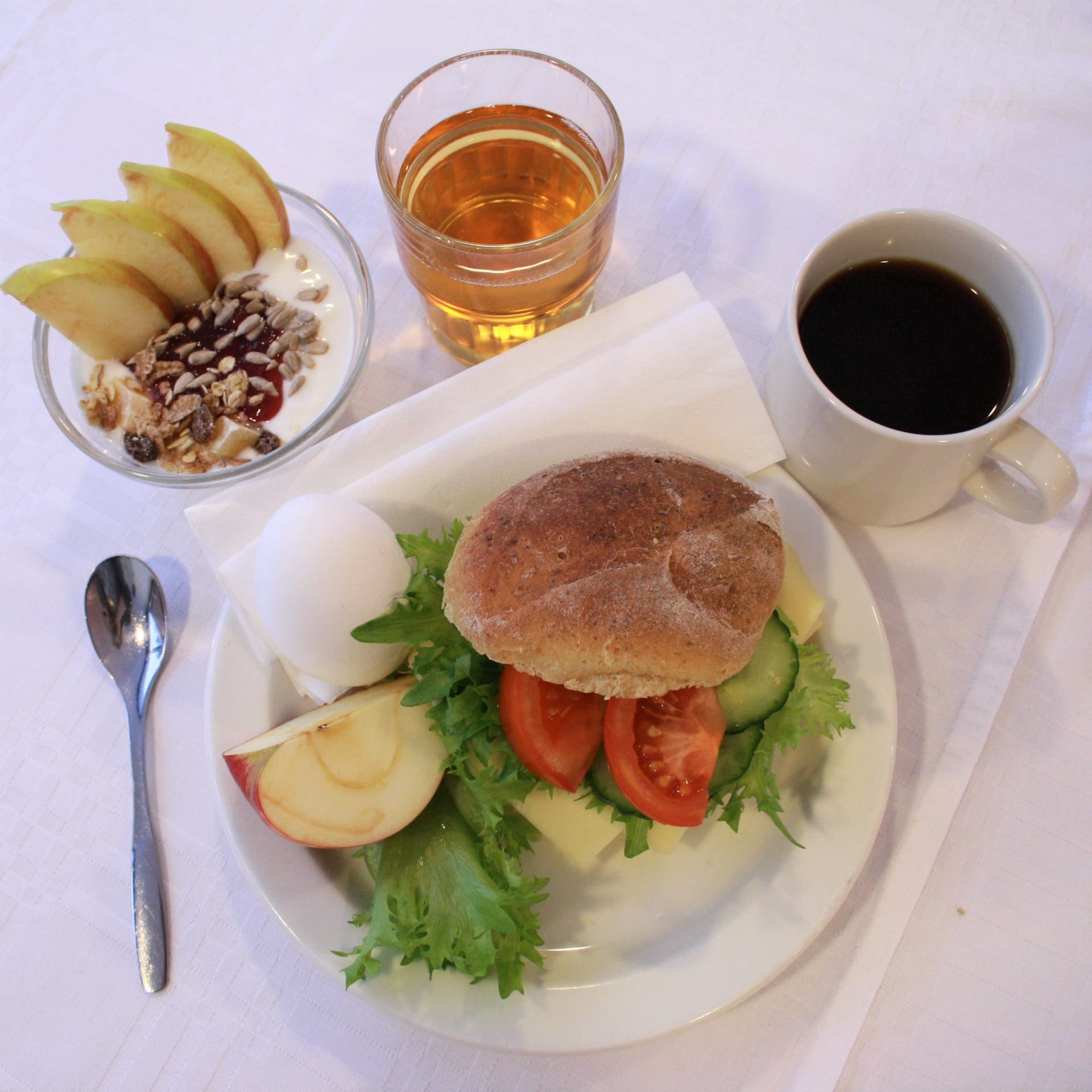 Breakfast, includes examble bread, fruits, jogurt, juice and coffee, Restaurant Lehmiranta.