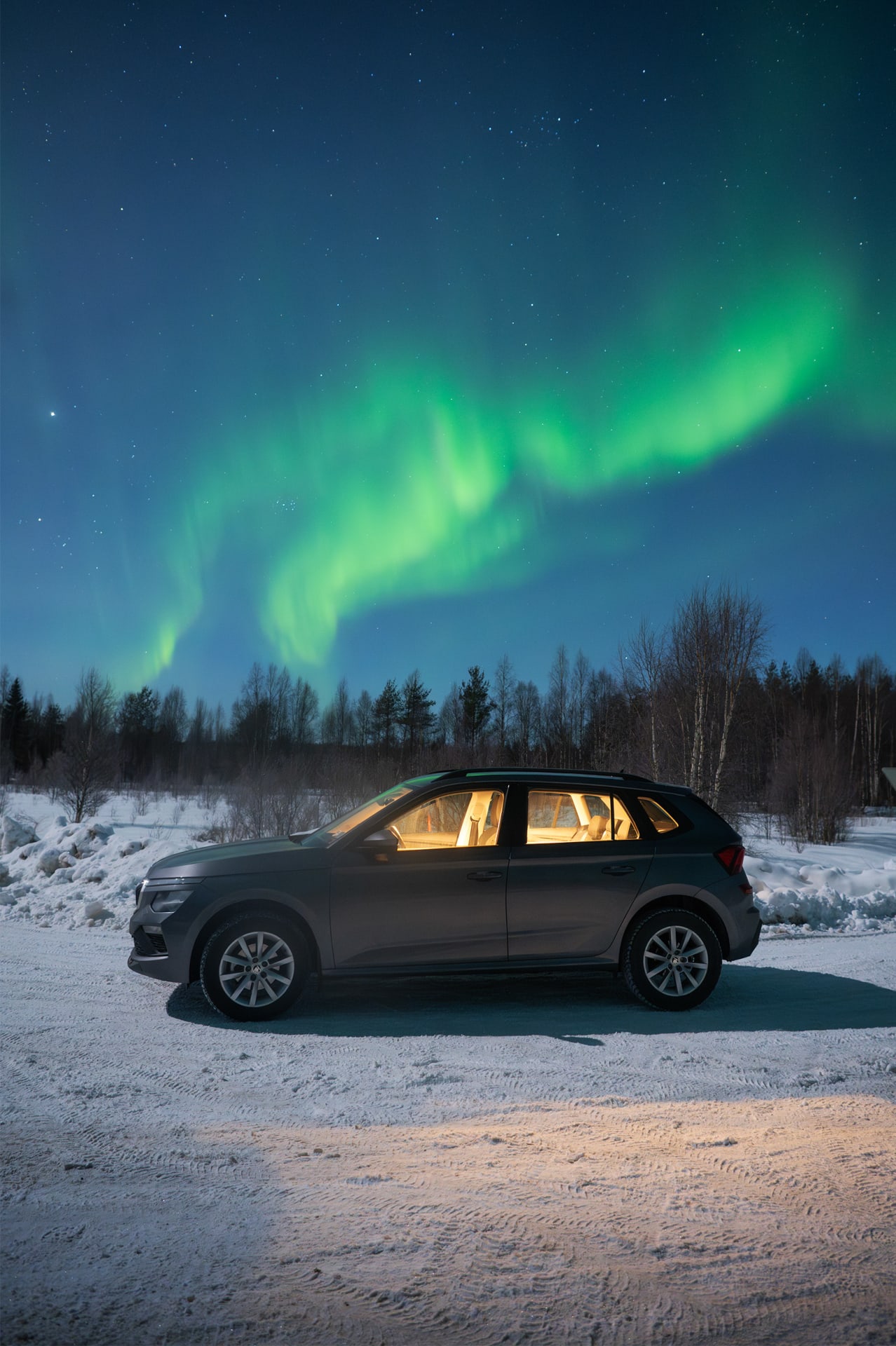 Avis Budget car under Aurora Borealis
