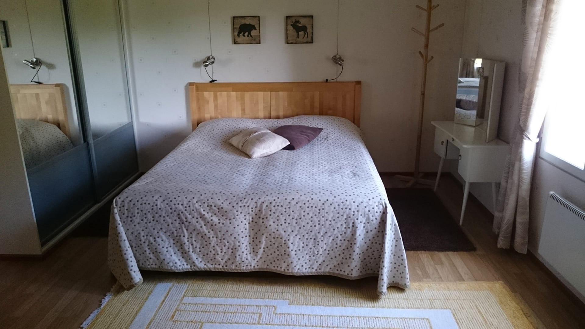 Twin beds in the bedroom of Vacation House Kommee Kurki