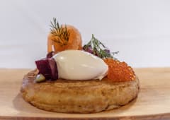 Blini with smoked salmon and salmon roe.