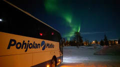 Bus with northern lights