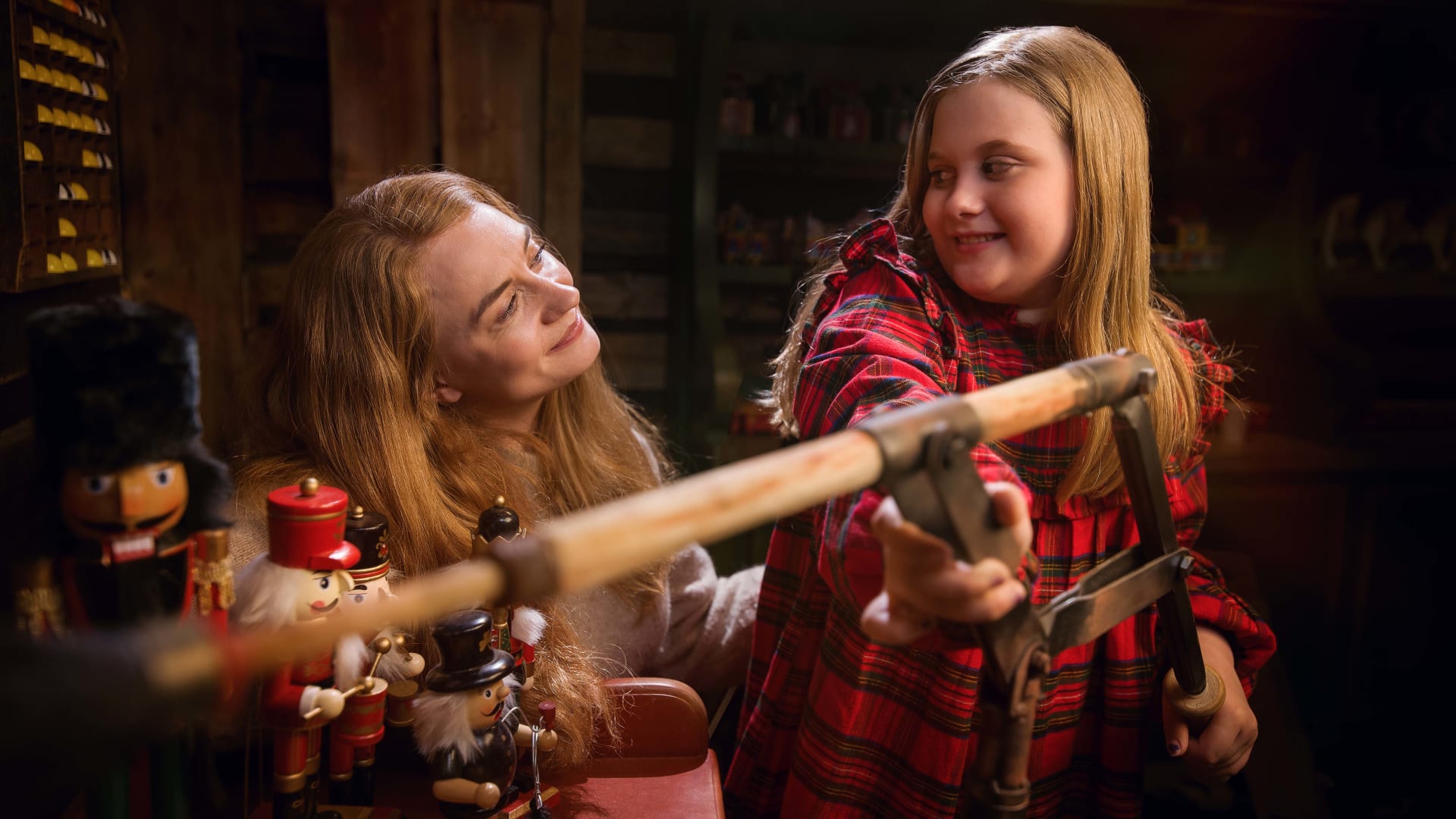 Family enjoying everl-lasting christmas memories at Toy Factory in Santa Claus Secret Forest