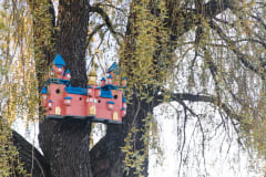 Pink castle birdhouse on a tree in Pikku Kakkonen playground Savonlinna