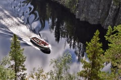 Three National Parks Summer Adventure in South Lapland - boat trip