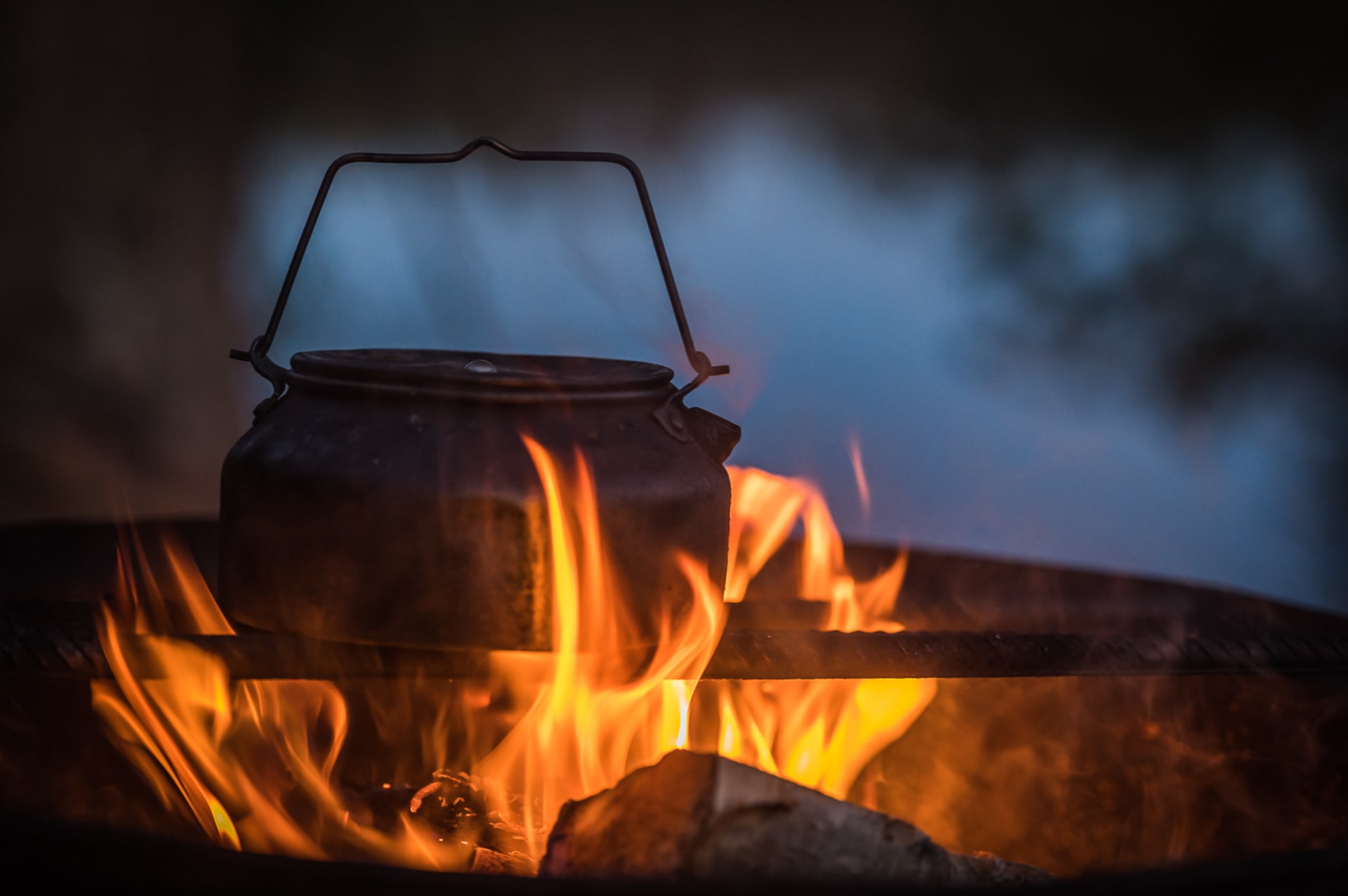Three National Parks Summer Adventure in South Lapland - coffee by the open fire