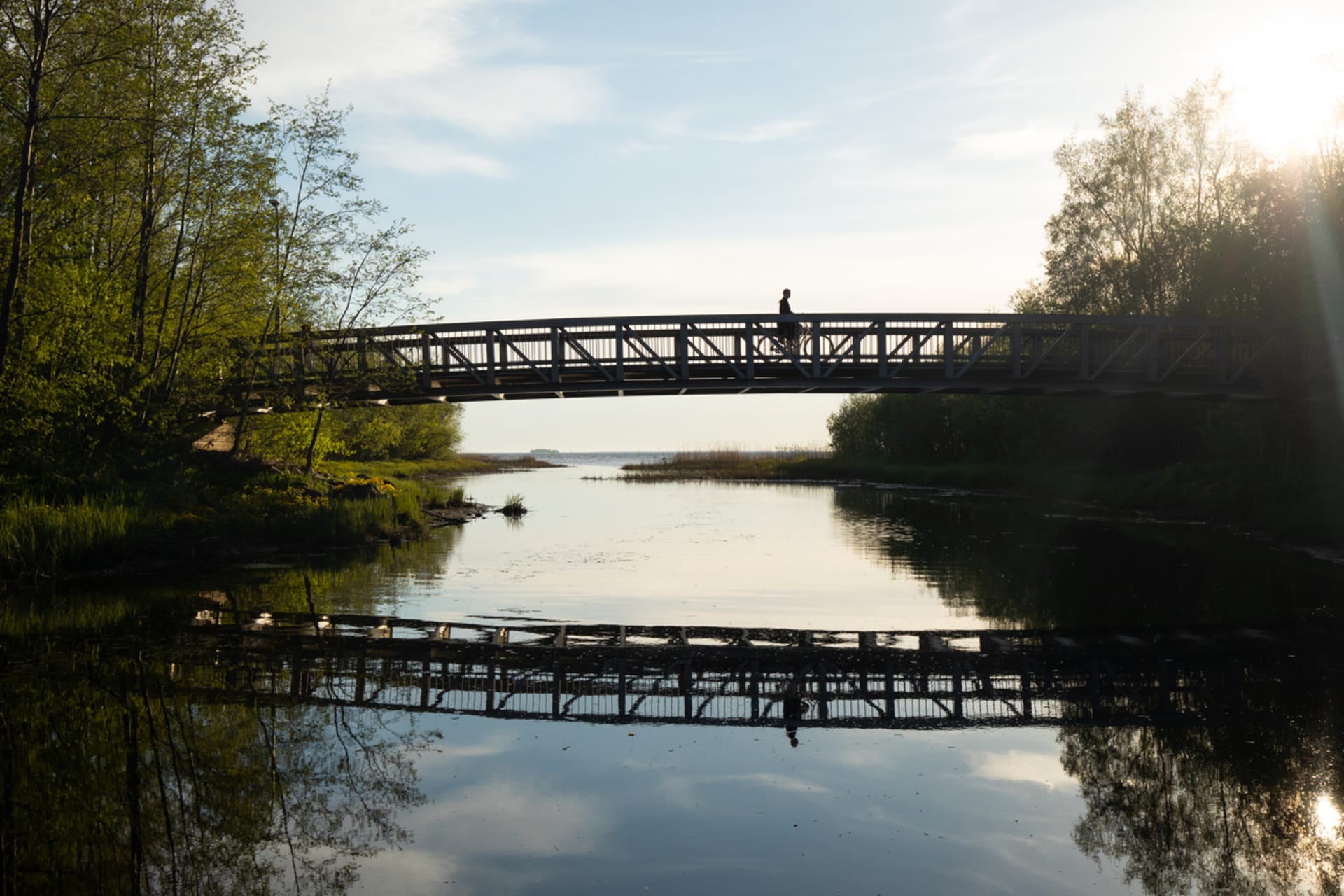 Pedestrian bridge over stream Mustasalmi in Hietasaari