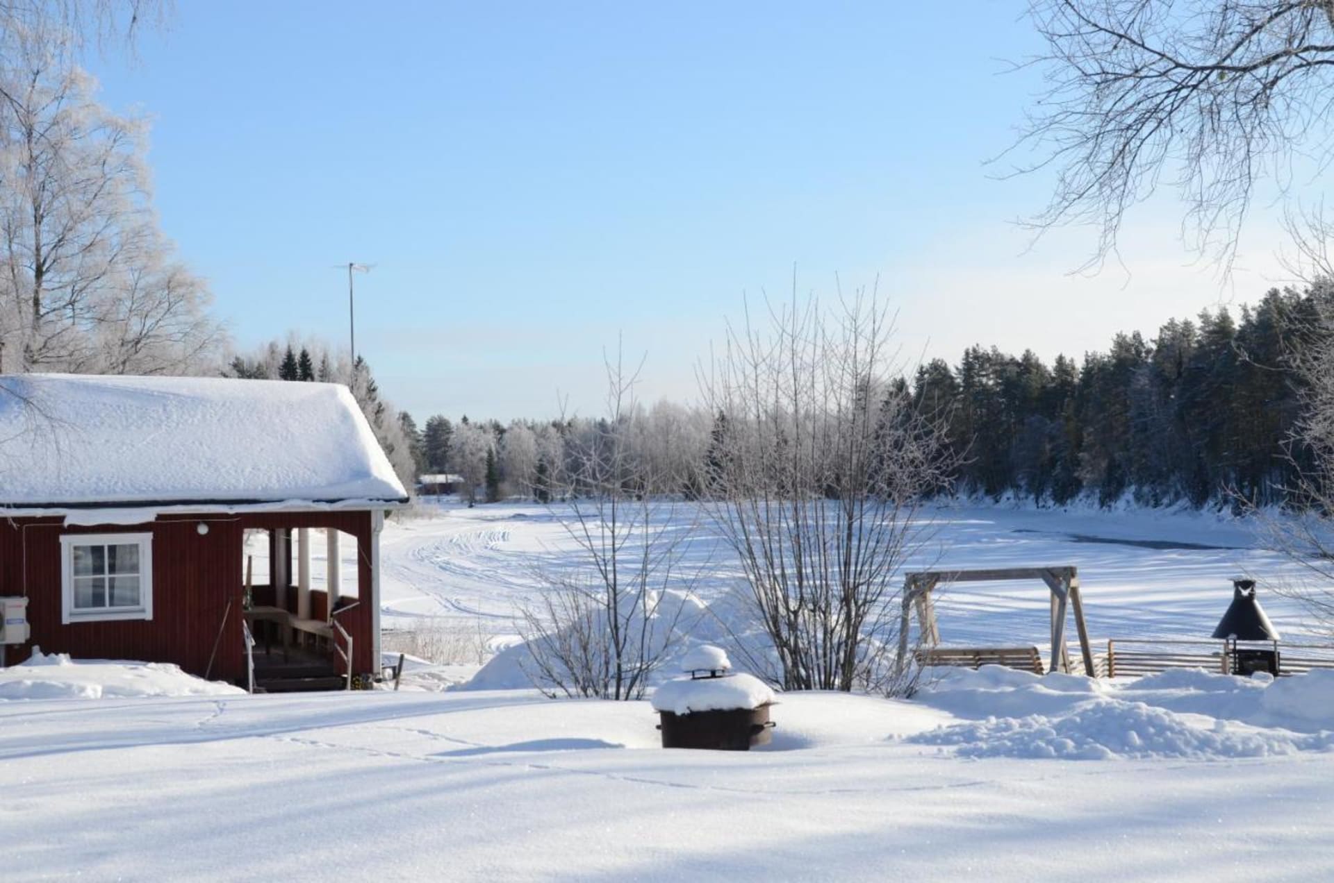 Taiga Resort sauna by the frozen river