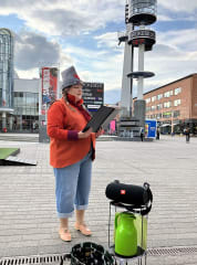 Good Will Elf telling stories at the Lordi's Square.