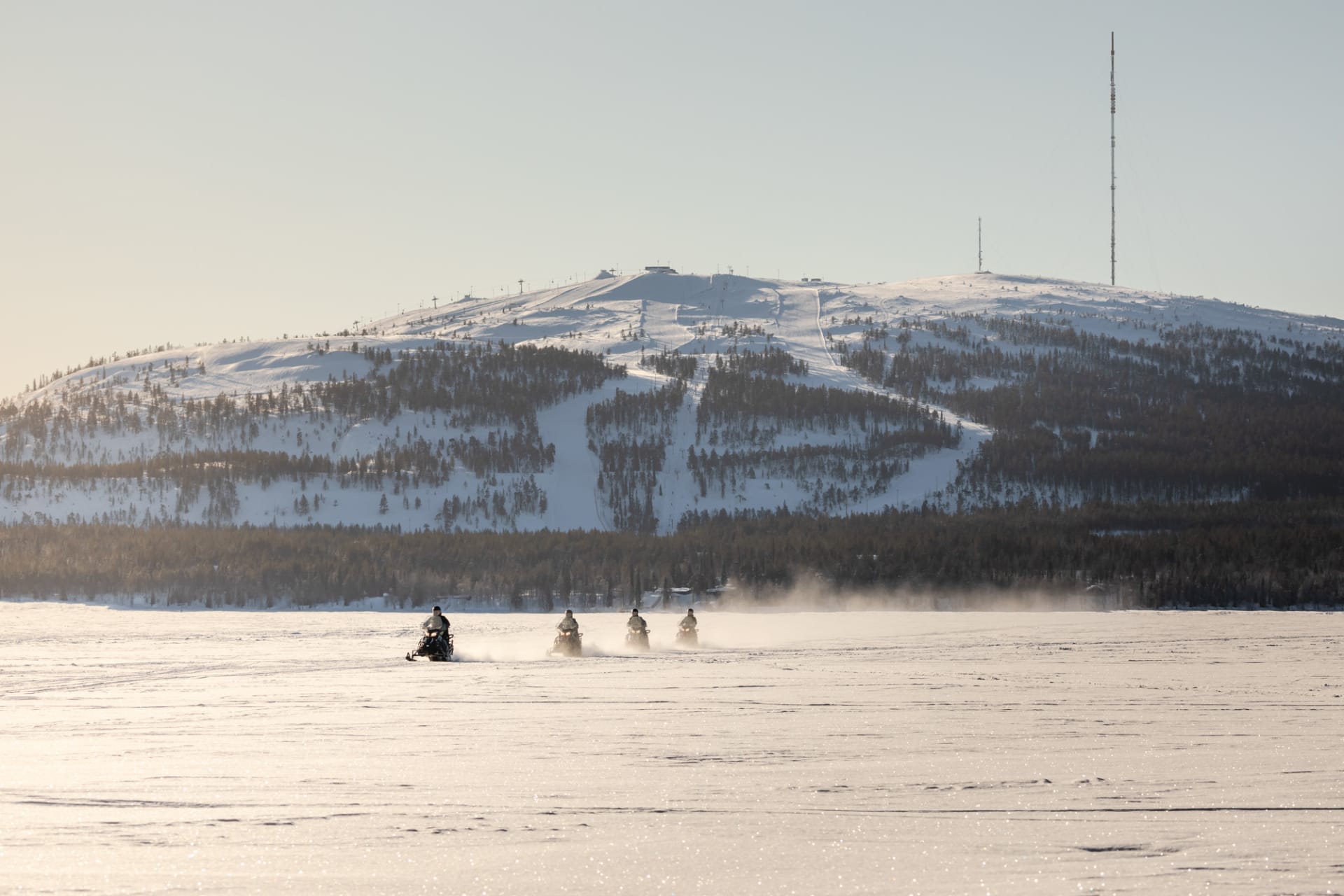 Across lake Pyhäjärvi on an Electric Snowmobile Arctic Nature Safari at Pyhä-Luosto, Lapland, Finland