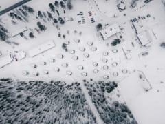 Snowy aerial view of Apukka Resort in Rovaniemi.