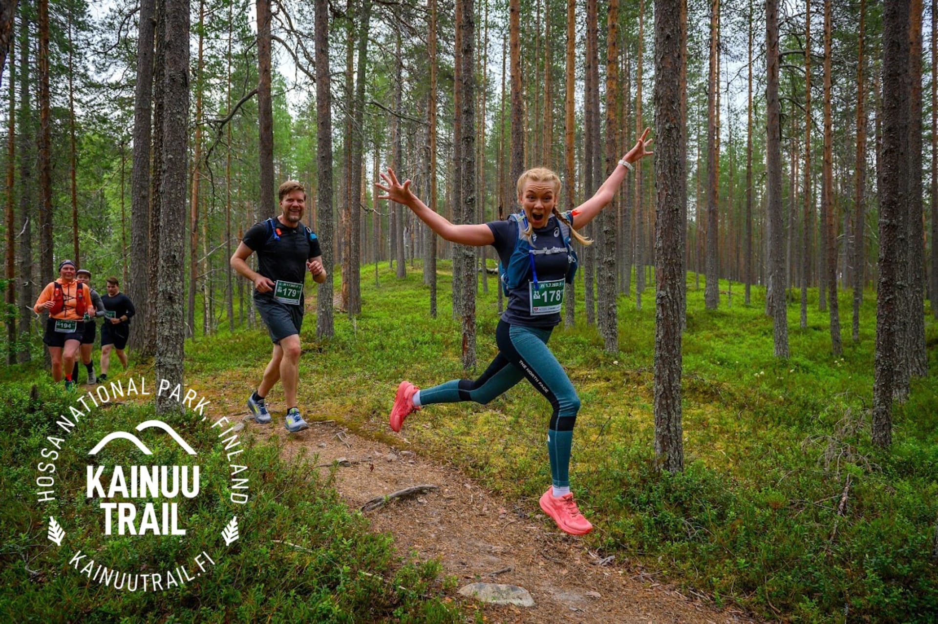 Happy trailrunner on the finest needle paths of Hossa National Park in Kainuu Trail 2023