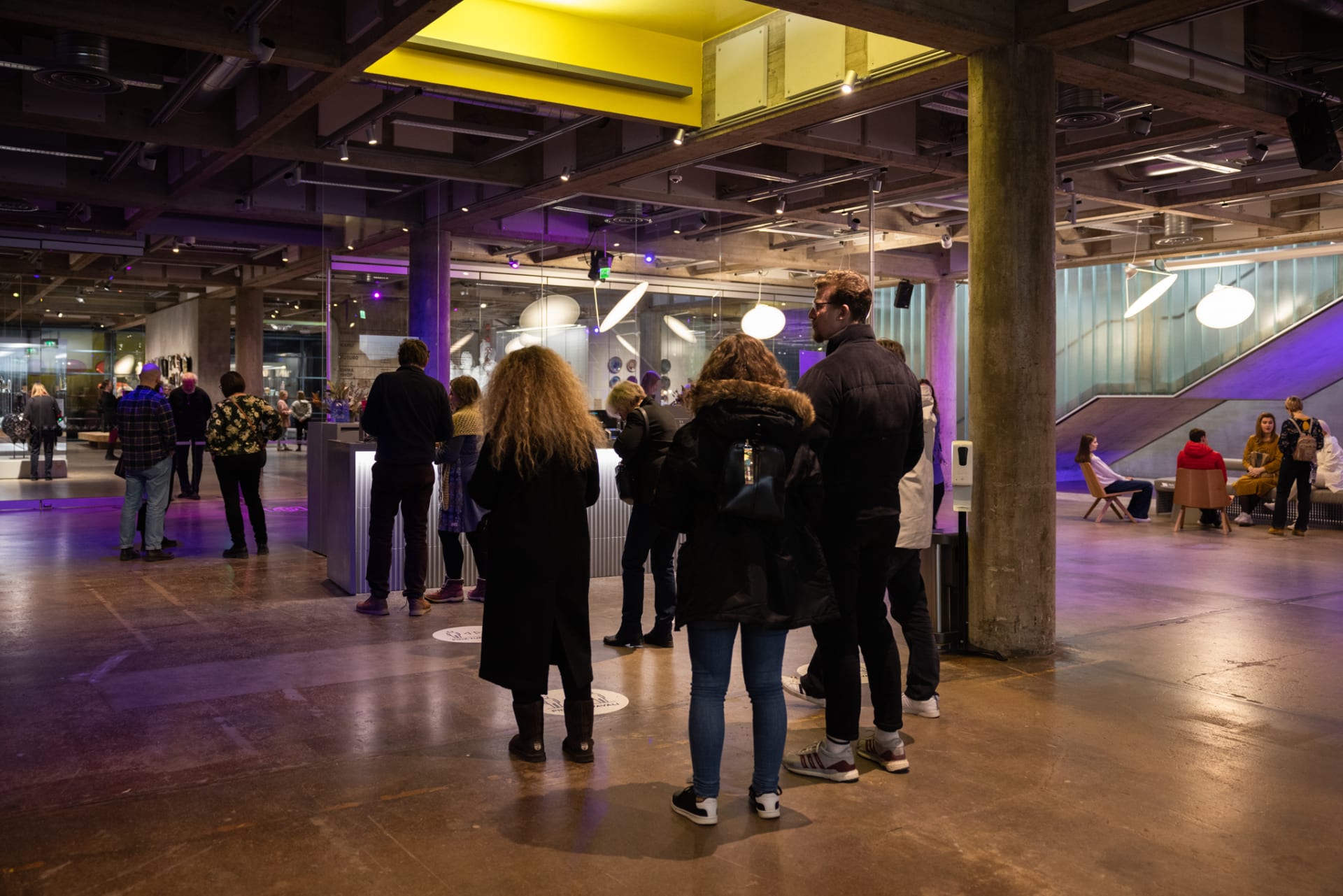 People queuing at WeeGee's ticket desk.