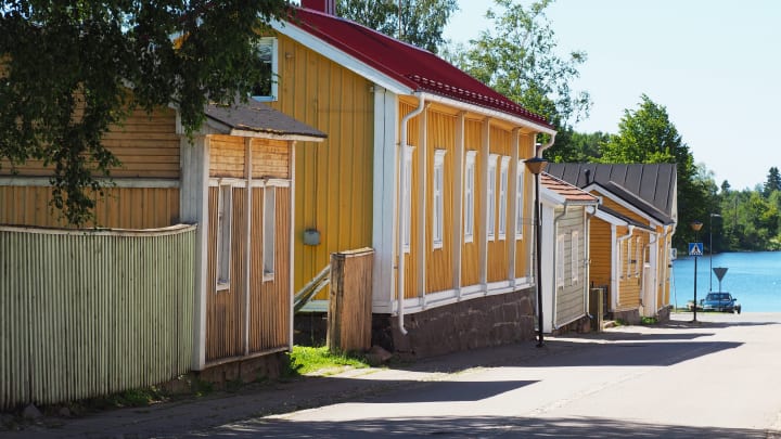 Old yellow wooden buildings on Cortenkatu street of Old Raahe