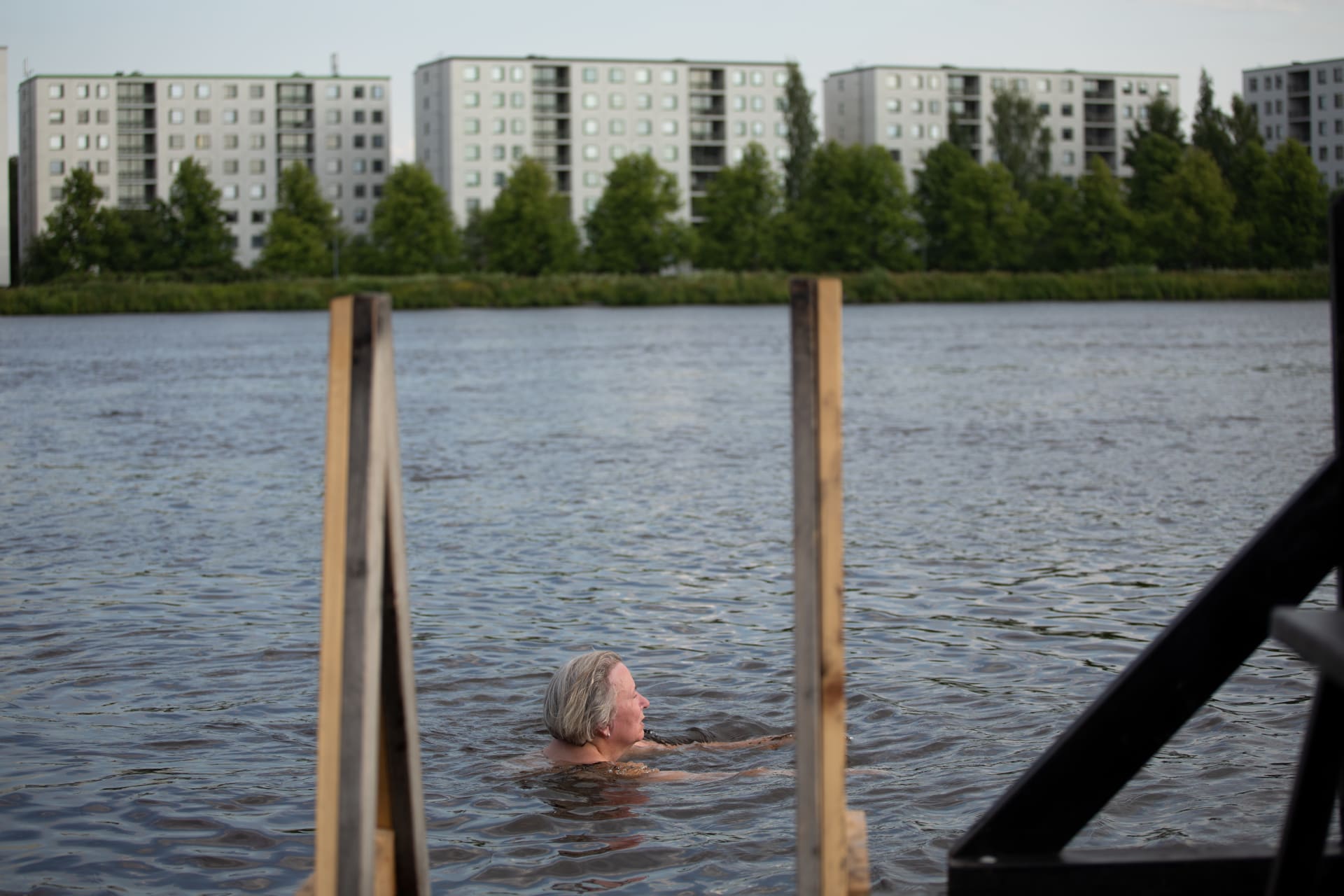 Swimming in the Oulujoki river.