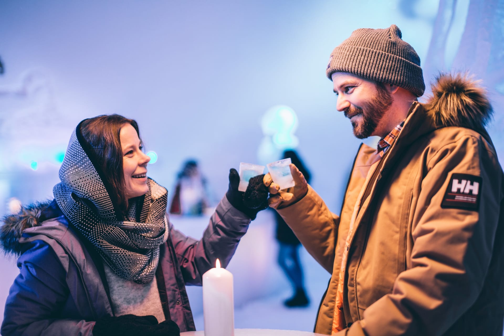 Cheers with an ice glass in Ice bar.