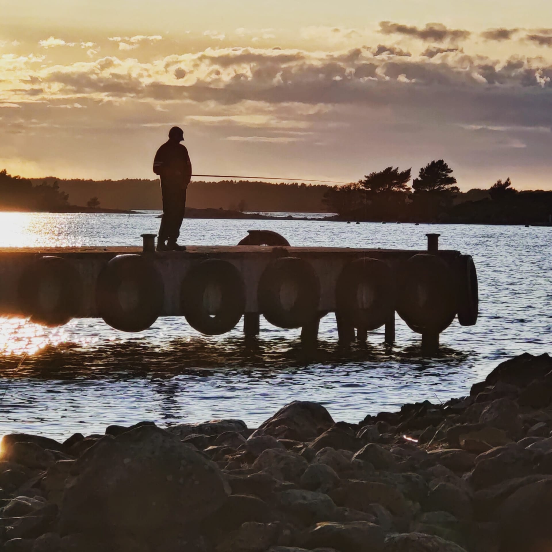 kalastaja ja laituri