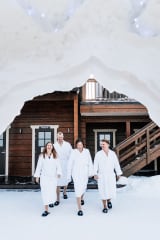 Guests enjoying the sauna experience at Arctic SnowHotel.