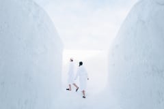 Guests going to outdoor jacuzzi after sauna.