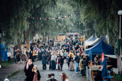 People enjoying the Häme Medieval Festival at the main street of the festival