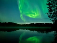 Northern Lights upon the lake during Autumn
