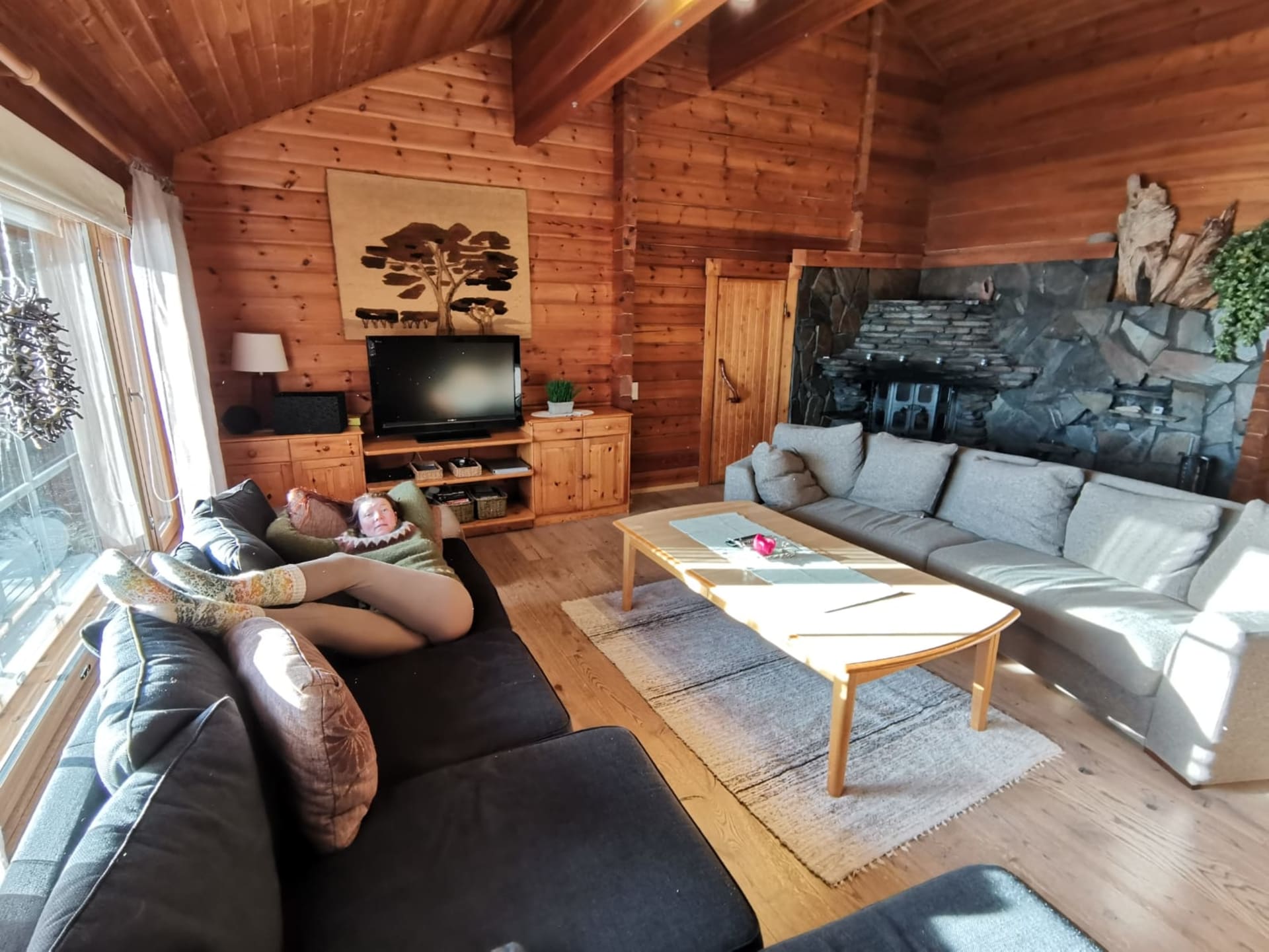 A living room with a fireplace