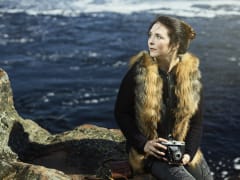 photographer wearing redfoxfur vest