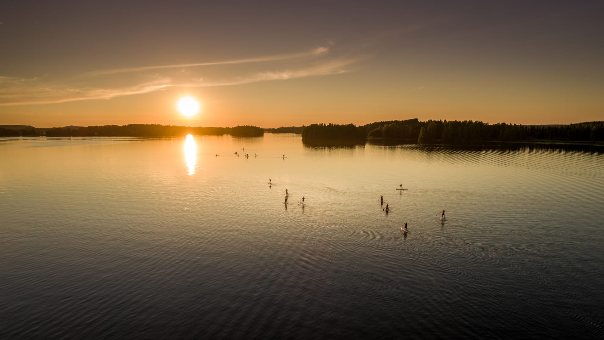 Sunset sup group at the lake