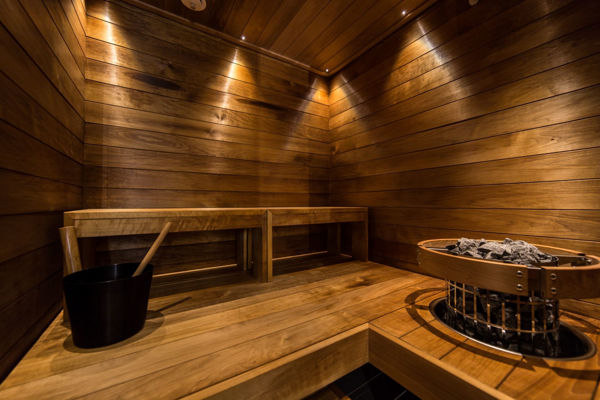 Each Glass Apartment has a Hot Spring outdoor hot tub and a private Sauna.