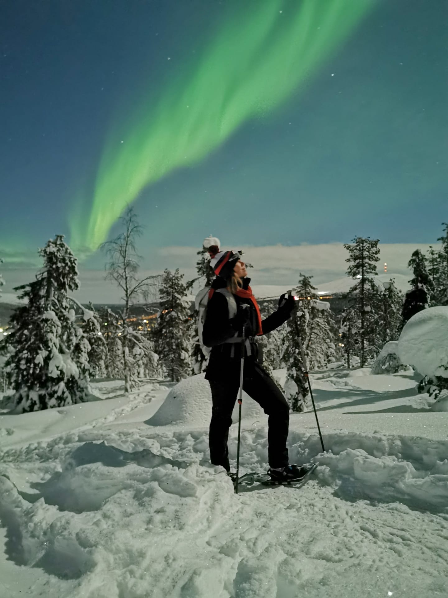 Snowshoeing under the northern lights