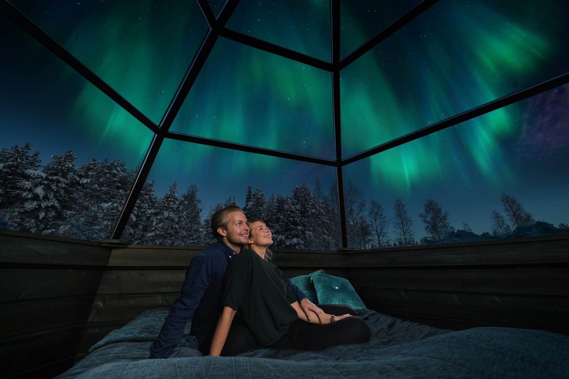 Northern lights inside of a Glass Igloo.