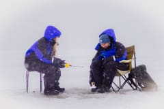 ice fishing on the frozen sea