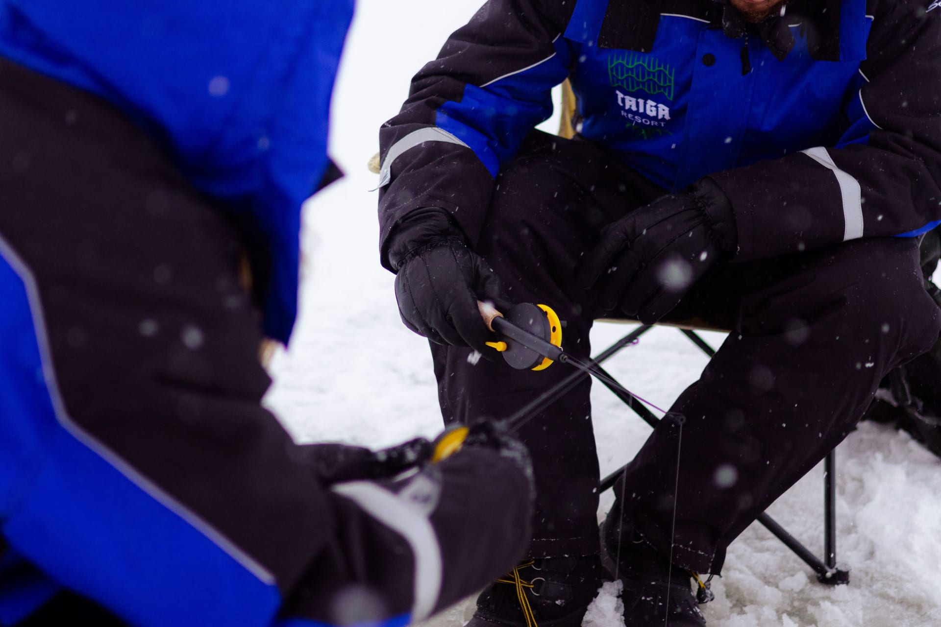 ice fishing on the frozen sea
