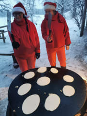 Making pancakes in open fire
