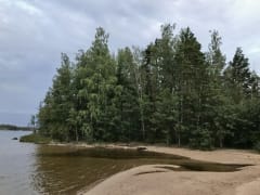 A miniature sandy river leads from lake Saimaa to Enolampi pond.