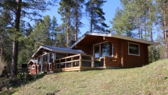 The log cabin with sleeping shed is located on the shore of the pond. Log cabins accommodation is for four people. Accommodation in two separate cabins.