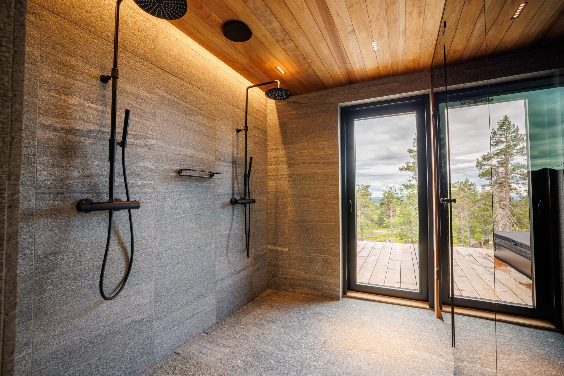 Main bathroom with sauna, two showers and entrance to outdoor terrace and jacuzzi