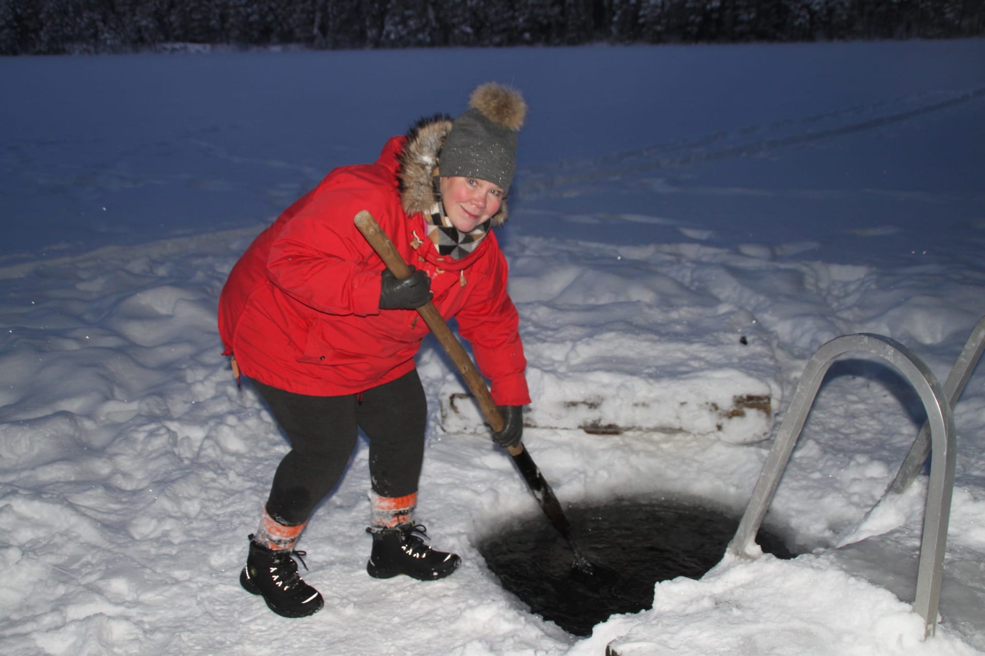 During winter swimming starts with making a hole into the ice!