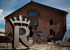 Main entrance of the Rosenlew Museum with artwork with the letters R in the foreground.
