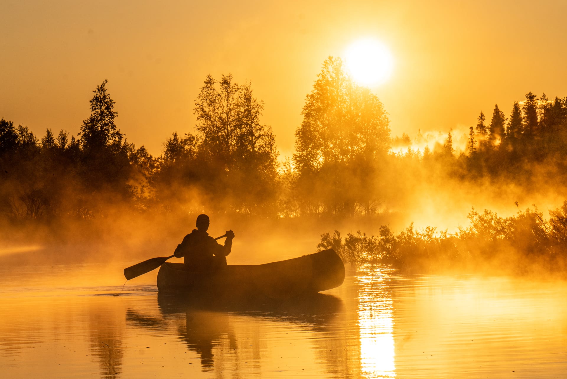 Canoeing under the midnight sun.