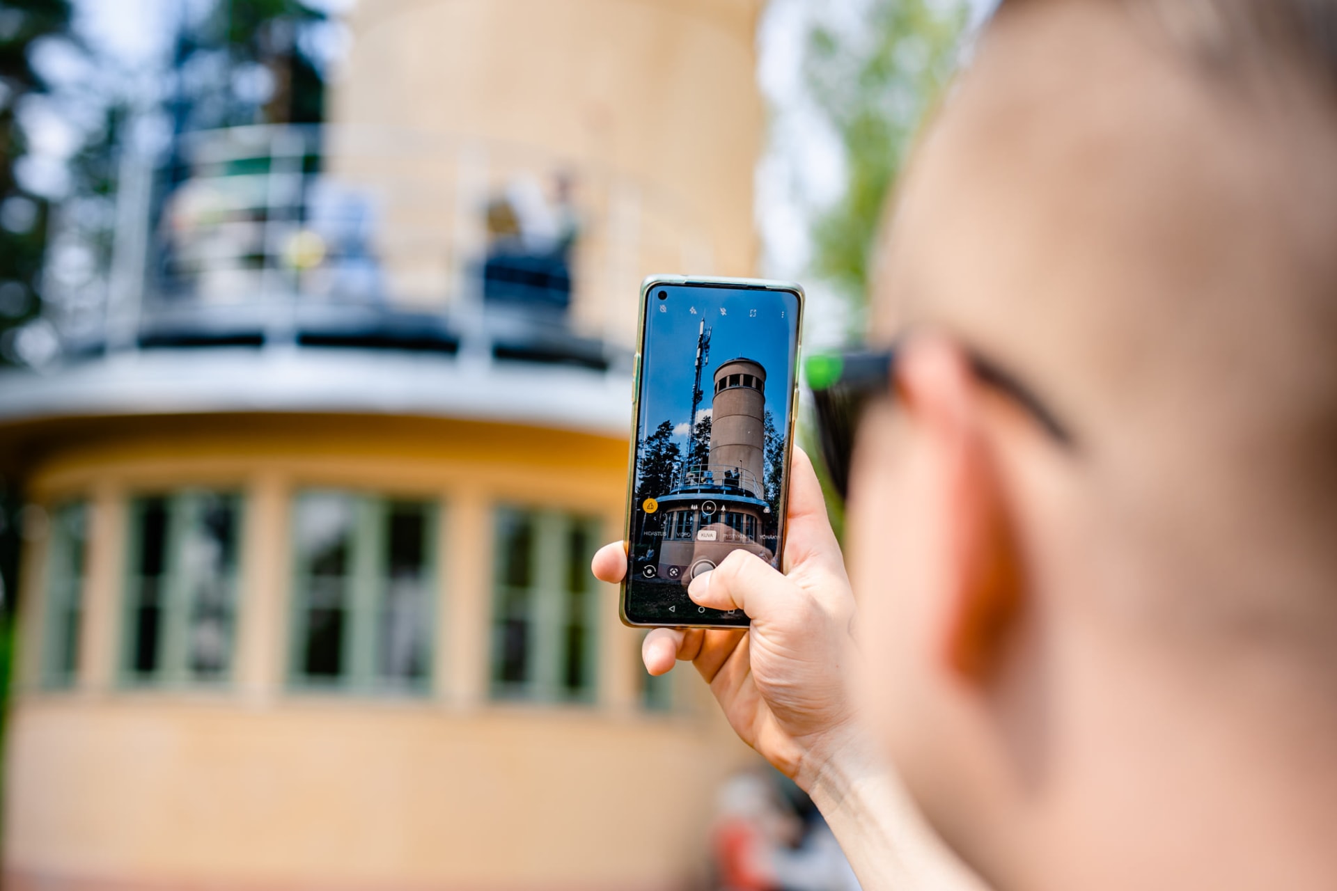 Person taking a picture of a landmark