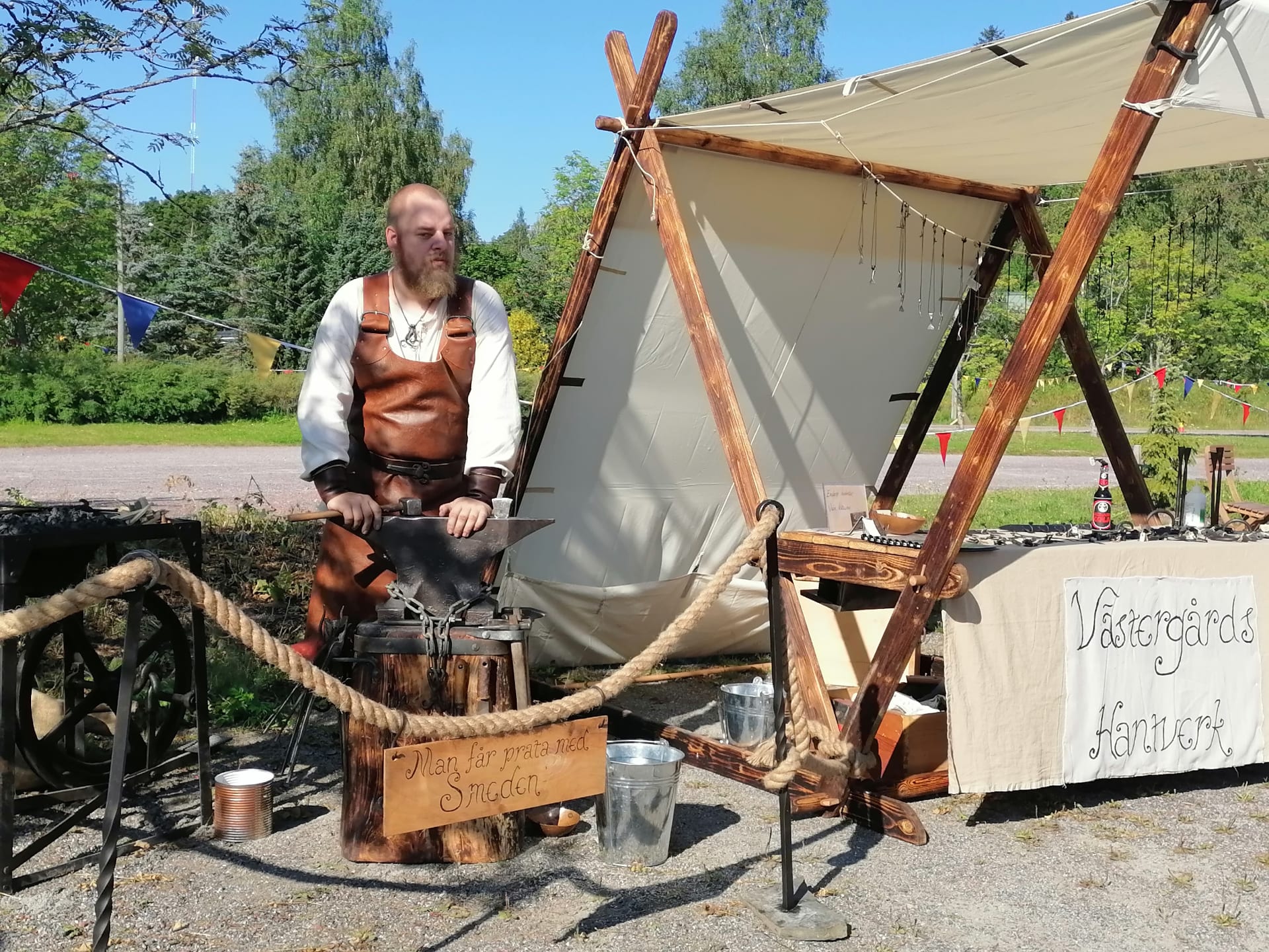 The blacksmith with his tent at a market