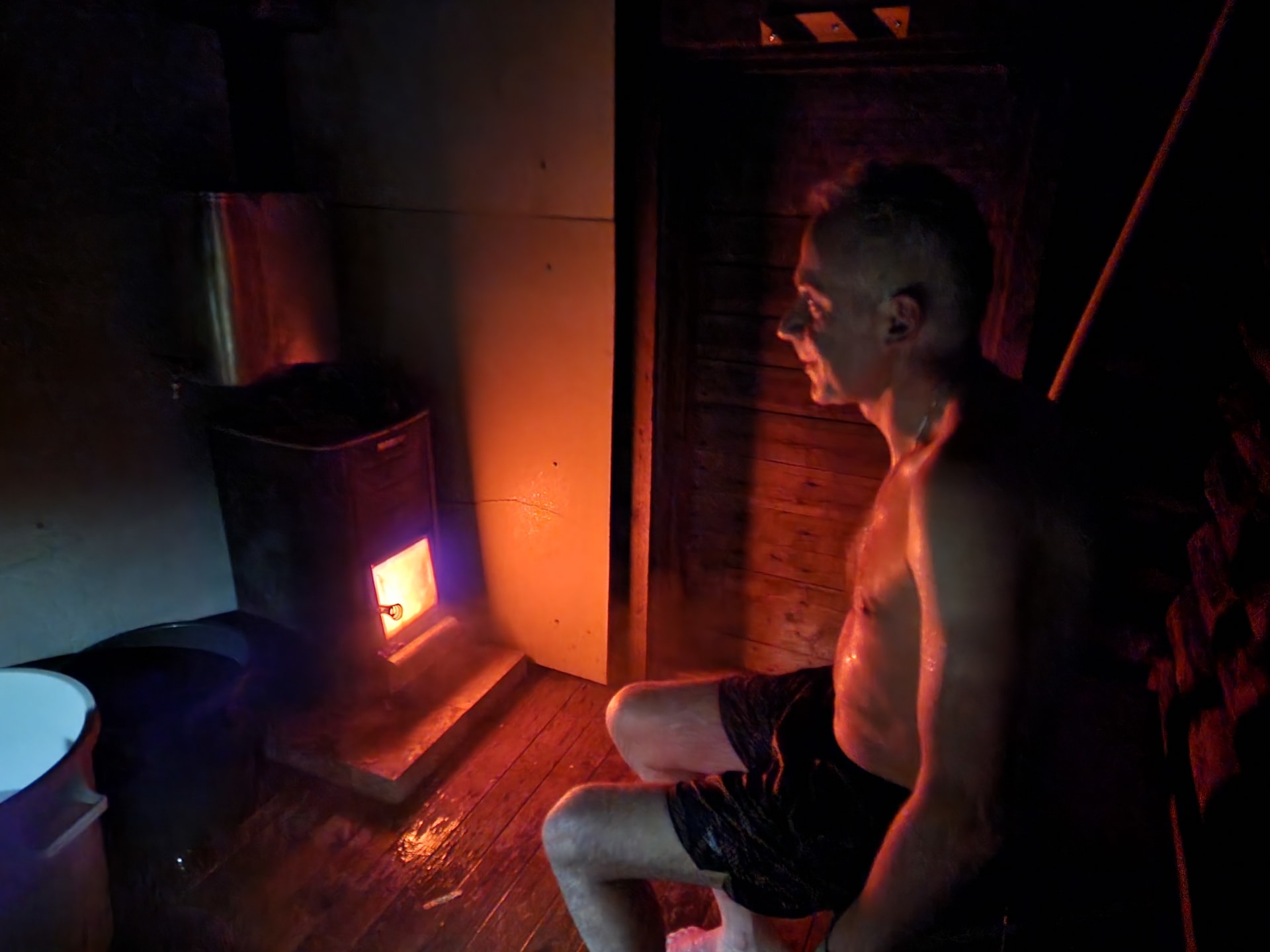 Man enjoying the heat of the sauna in Kotatieva