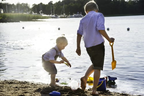 Children playiing at the beach in Naantali