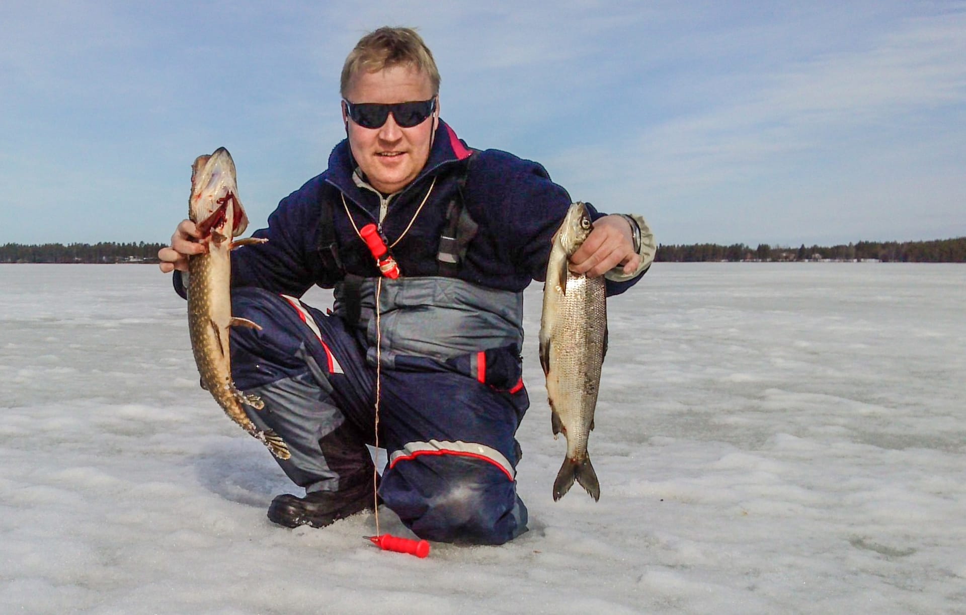 Ice fishing Sea Lapland