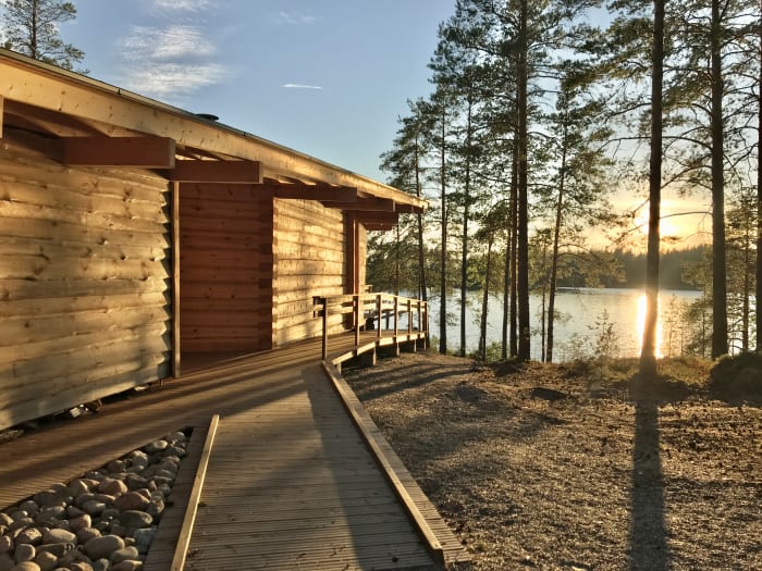 The Norppalaavu lean-to is accessible and spacious, made from local logs in a traditional way.