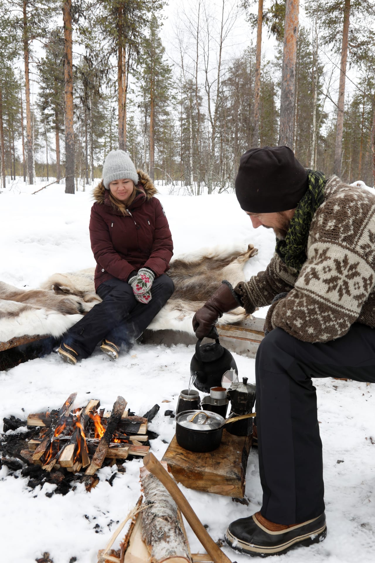 Making coffee by the campfire in early spring